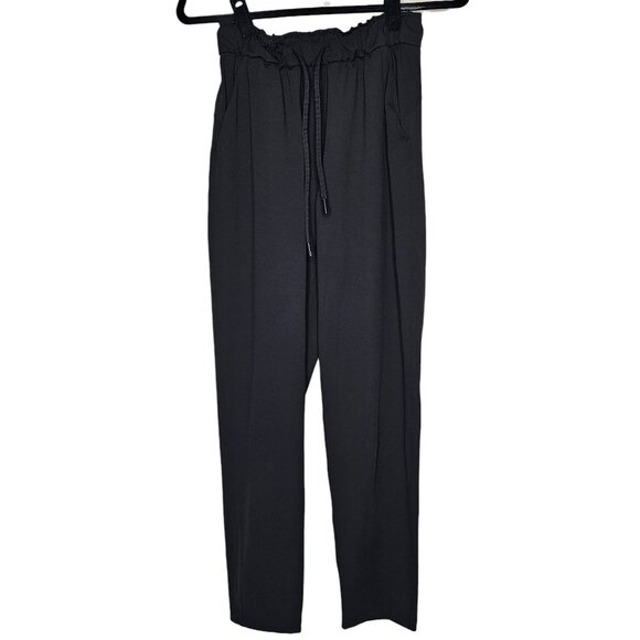 Lululemon Size 4 Black Keep Moving Pant 7/8 High Rise Relaxed Fit Sweat Wicking - Picture 2 of 10